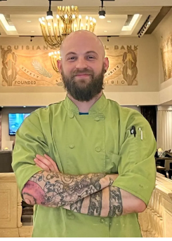 The Gregory's executive chef, Tre’ Veillon, smiling in uniform